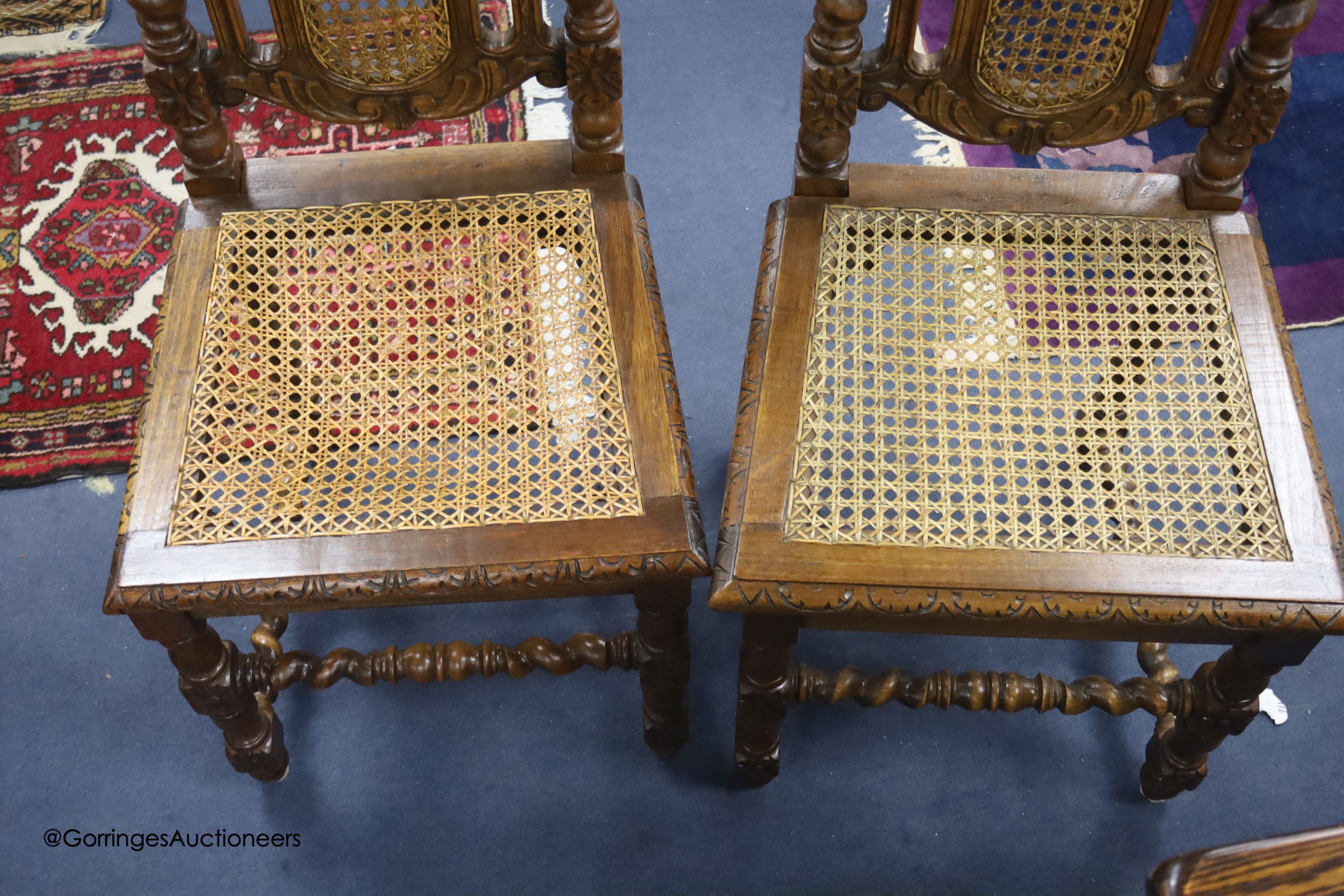 A set of twelve late Victorian caned oak dining chairs